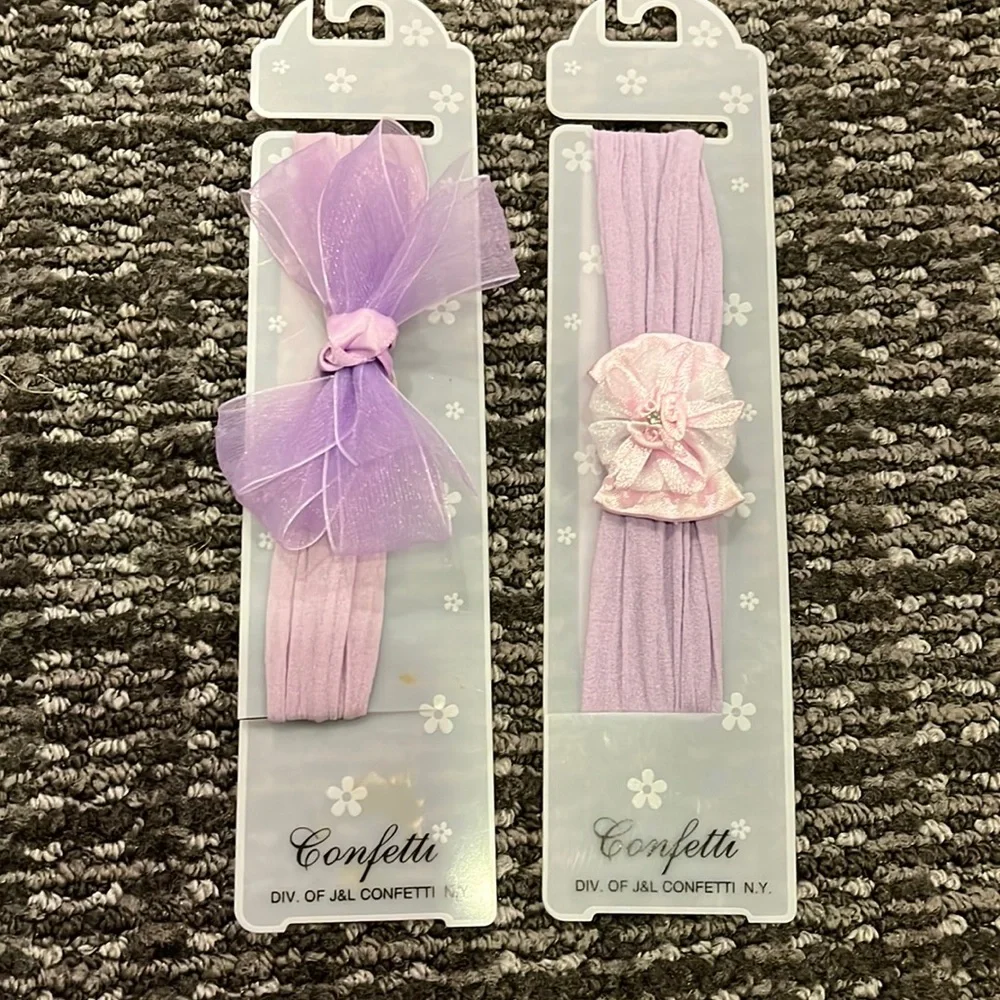2 purple baby headbands